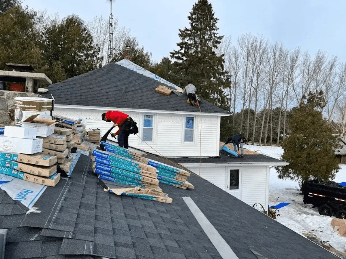 New roof installation in progress on a Traverse City home
