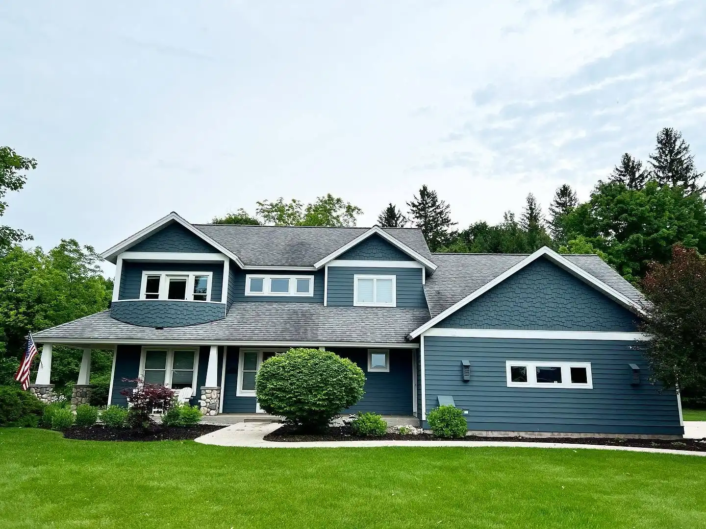 A completed Falcon Roofing project on a home in the Suttons Bay area of the Leelanau Peninsula